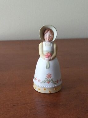 Avon Girl Yellow Dress Ceramic Bell with Pink Flowers